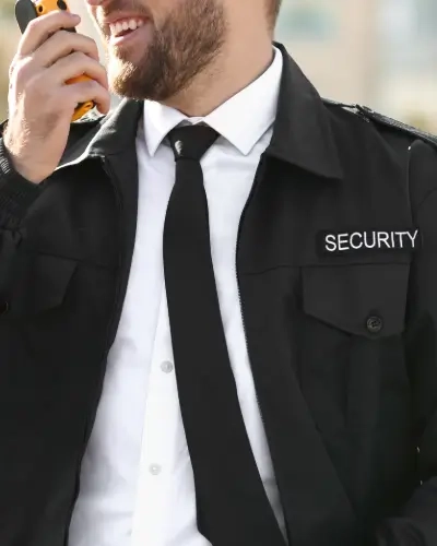Blog Tall Security Guard with Walkie Talkie