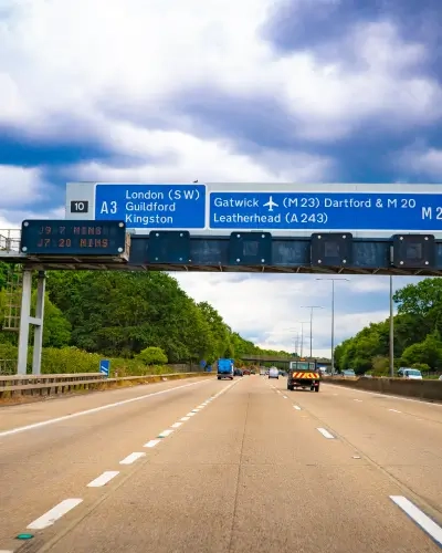Blog Tall Motorway with blue signs and LED speed alerts