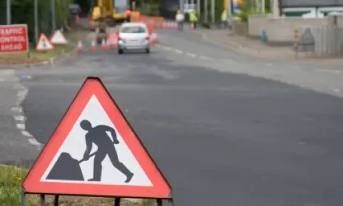 Blog Wide Roadworks with signs and workers