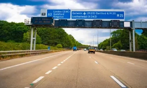 Blog Wide Motorway with blue signs and LED speed alerts