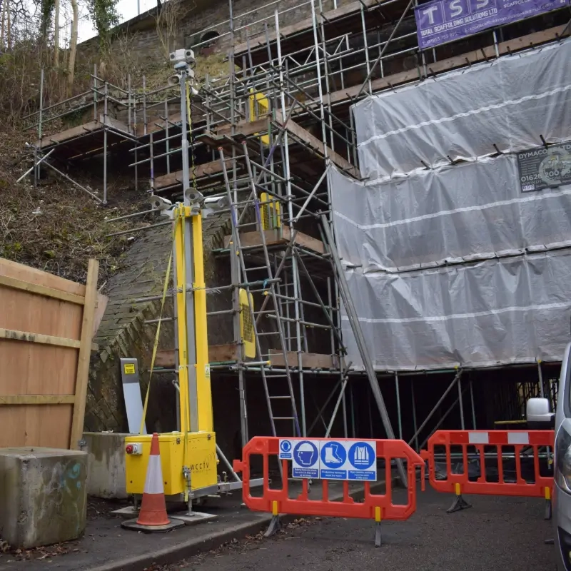 Tower near a bridge protecting scaffloding and stopping intruders