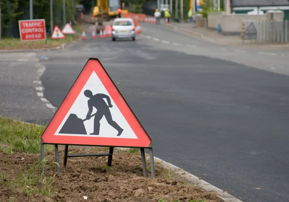 Blog Header Roadworks with signs and workers